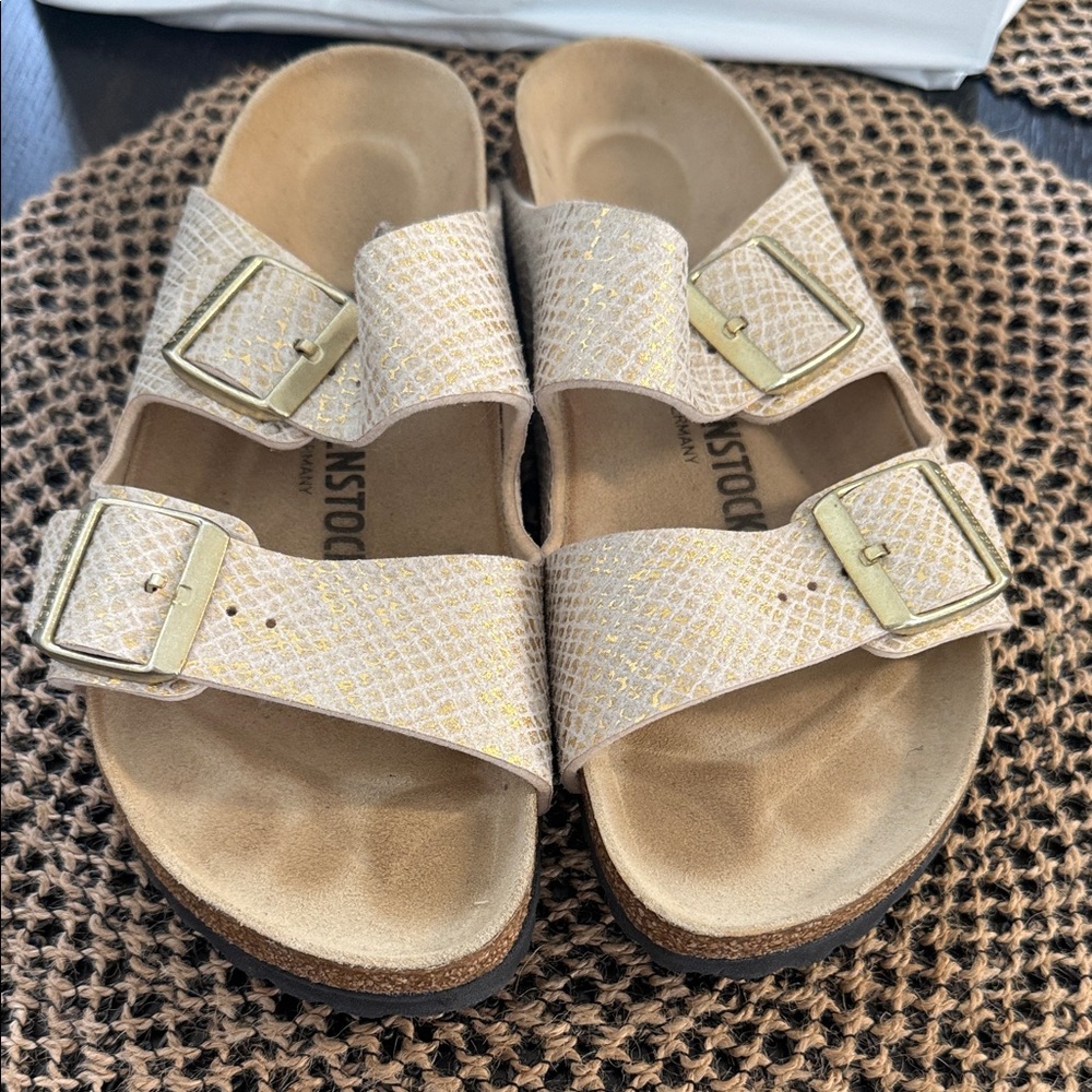 Birkenstock Cream Sandals with Gold Accents